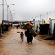 Illustration for article titled 144,000 Syrian refugees are packed in this endless city made of tents
